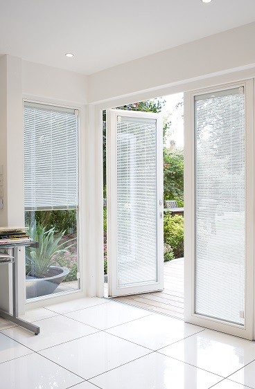Garden room white doors with integral blinds