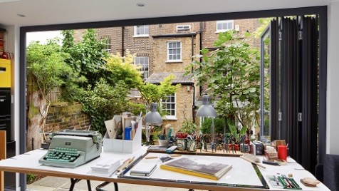 Designers prefer to work in natural light and a garden studio like this one is flooded with it, even with the glazed doors closed. However,in summer, the doors fold back and the studio and garden merge into one creative space. 