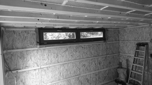 Insulated garden room with high level window