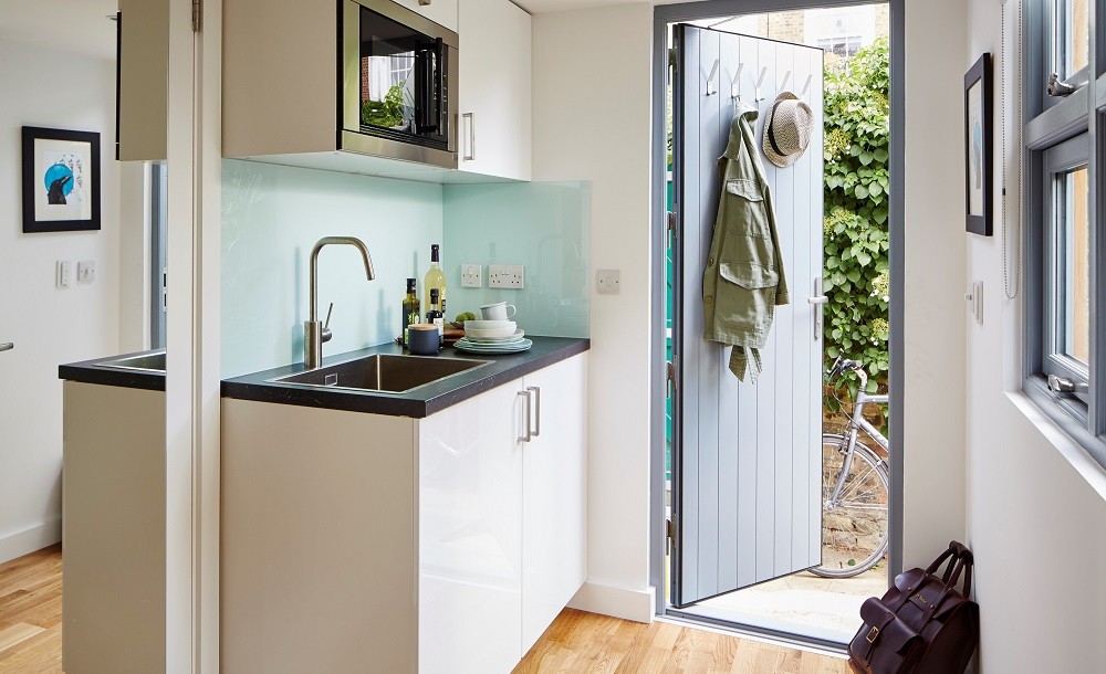 Compact kitchenette in a self contained garden studio