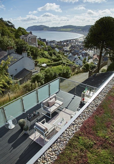 Holiday garden annexe with green roof and deck area overlooking the Llandudno bay